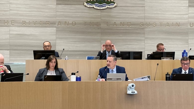 Councillors and the mayor in council chambers