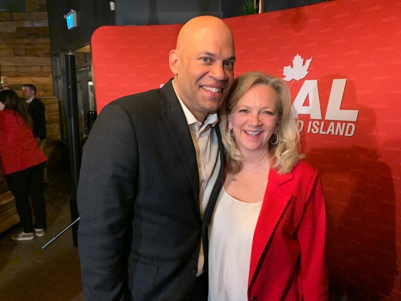 Re-elected MLA Gordon McNeilly with poses with P.E.I. Liberal Party Sharon Cameron.