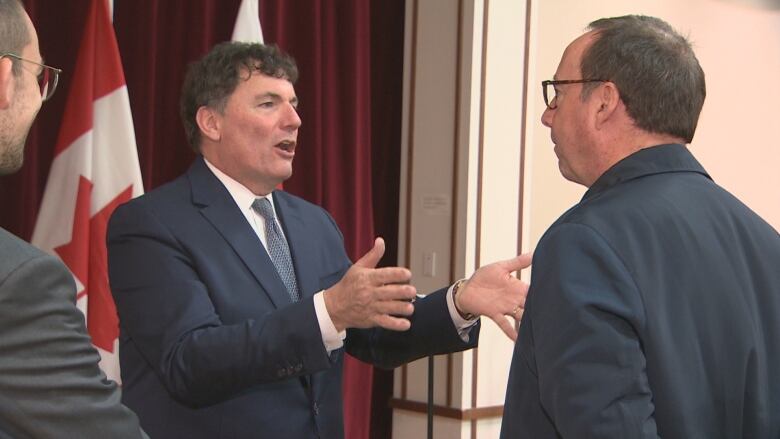 Federal infrastructure minister Dominic LeBlanc gesticulates while speaking to CBC's Paul Withers.