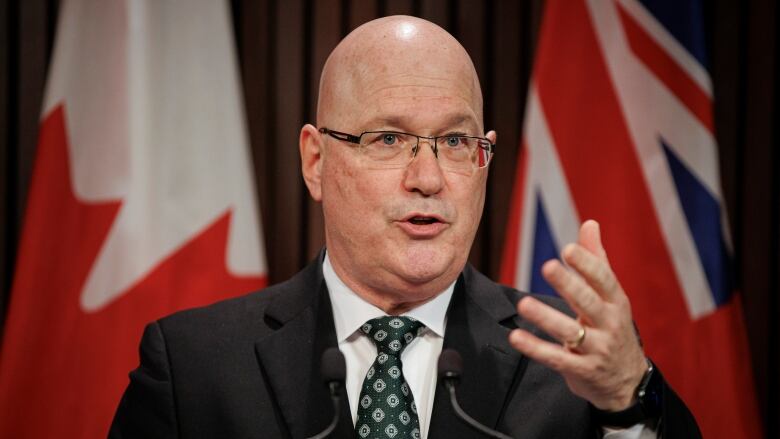 Minister of Municipal Affairs and Housing, Steve Clark, takes questions from members of the media after tabling new affordable home legislation, at Queens Park, in Toronto, on March 30, 2022.