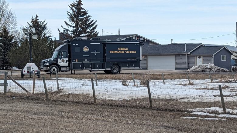 A police vehicle outside of a home.