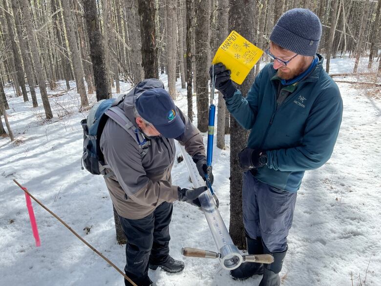 Pomeroy is pictured alongside a technician conducting a snow survey at the Marmot Creek Research Basin on April 11, 2023. 