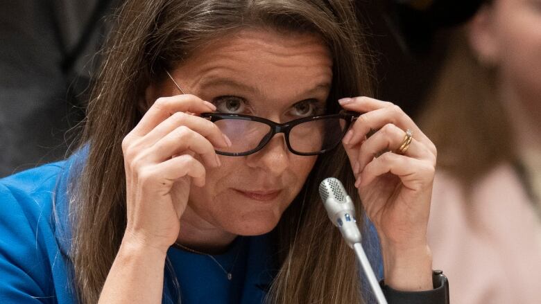 An image of Katie Telford giving evidence at a parliamentary committee.