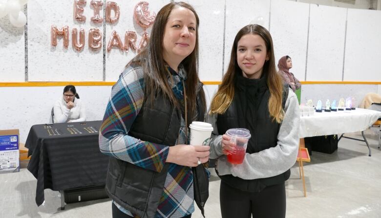 A mother and daughter are pictured.