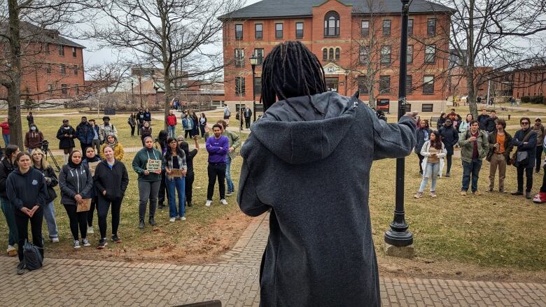 UPEI students hold a rally on campus to voice their concerns about the back-to-school plan.