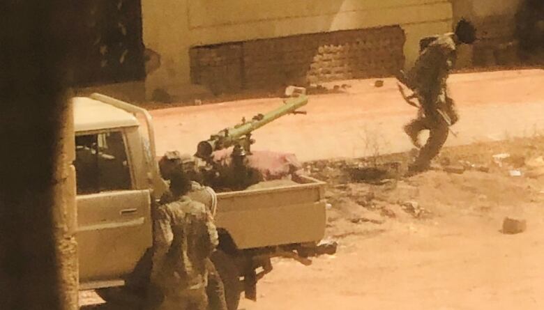 A photo from social media shows several soldiers near a truck.