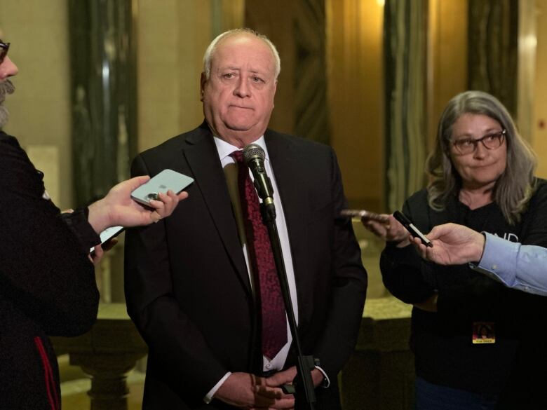 Saskatchewan Minister of Agriculture David Marit talks to reporters. 