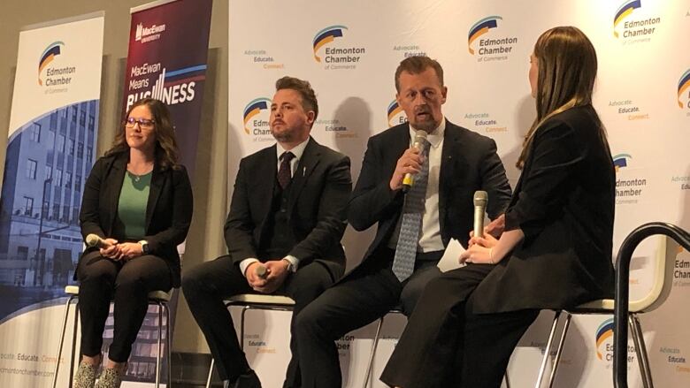 Public Safety Minister Mike Ellis speaks to the moderator of an question and answer session at an Edmonton Chamber of Commerce event on Wednesday. 