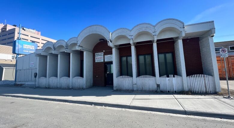 Greek-looking arched building. 