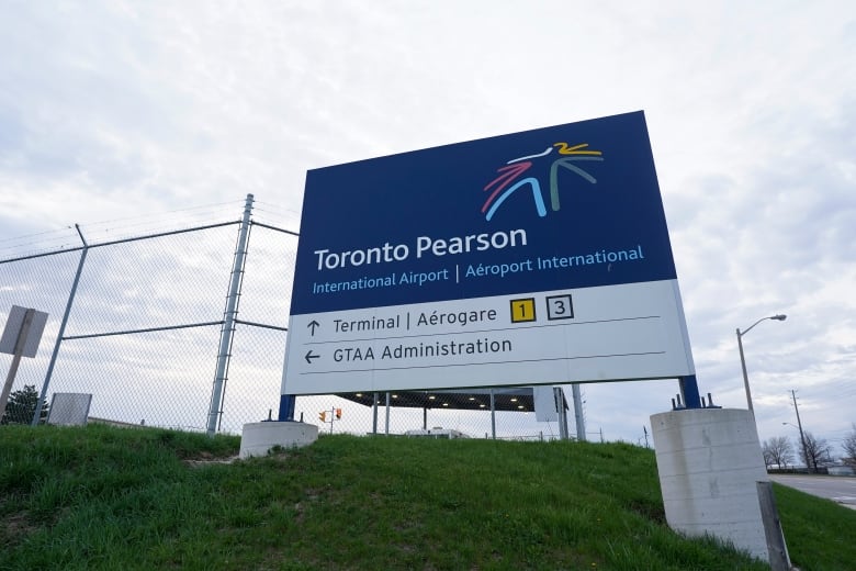 A sign for Toronto Pearson International Airport is pictured in Mississauga, Ont., on Thursday, April 20, 2023.