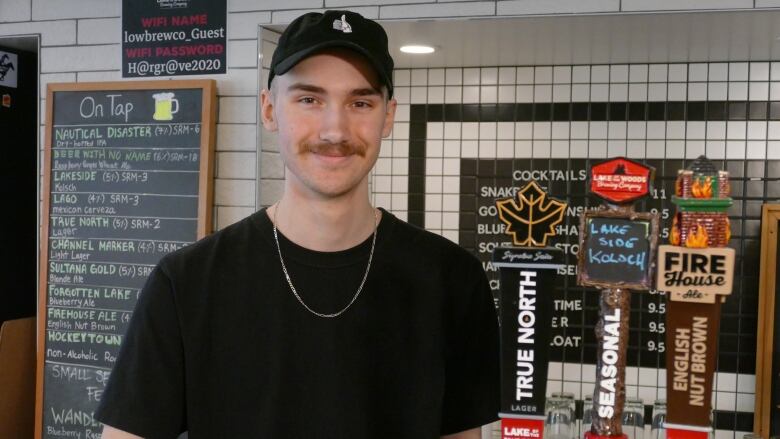 Lake of the Woods bartender Erik McCarthy is eager for Monday and all the customers that will flow in for beers and to cheer on the Jets in game four. 