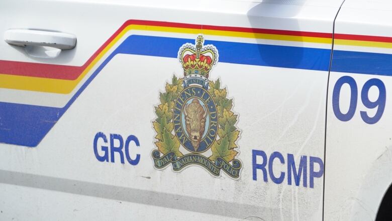 A close up of the side of an RCMP vehicle.