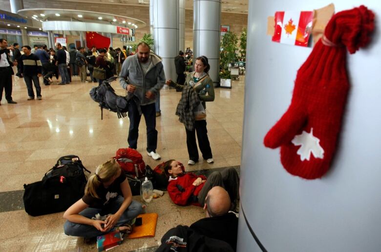 A group of Canadian tourists awaiting a flight out of Egypt at Cairo's international airport in January 2011.