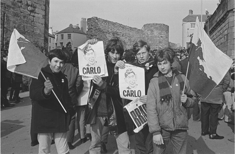 Protestors gather ahead of the 1969 investiture of Prince Charles at Caernarfon Castle in North Wales. 