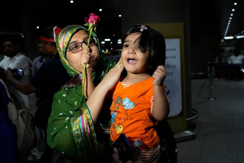 Indian citizens who were evacuated from Sudan arrive at the Mumbai International Airport in Mumbai, India on April 27, 2023.