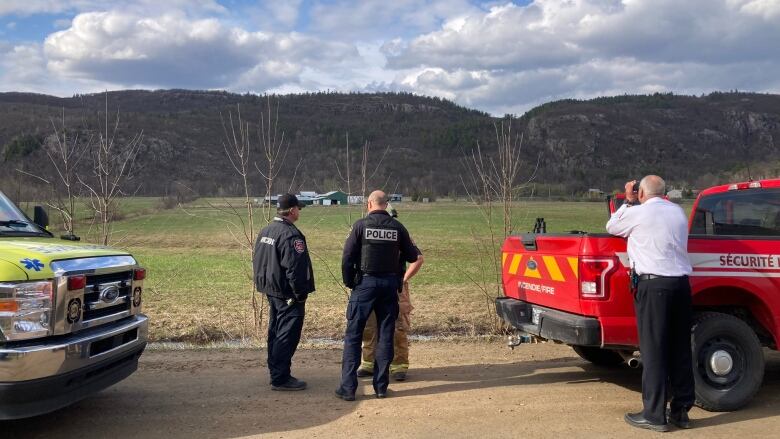 First responders survey the Gatineau hills.