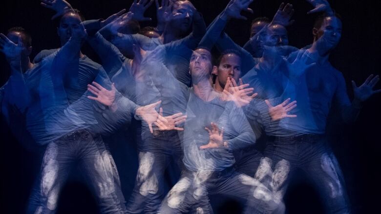 A mime in different positions on a stage.