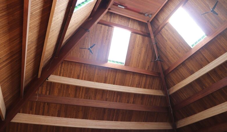 A wooden pyramid seen from inside.