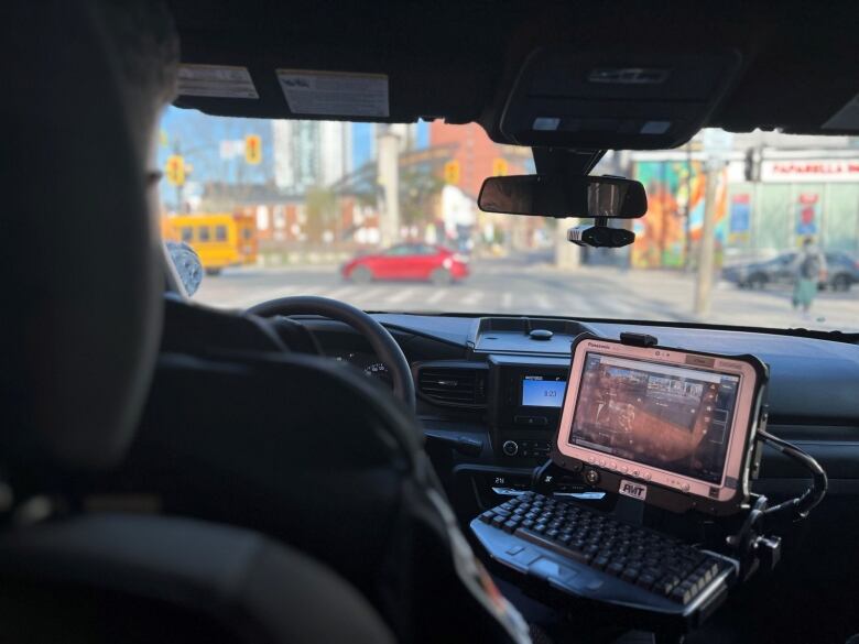 The inside of a police car.