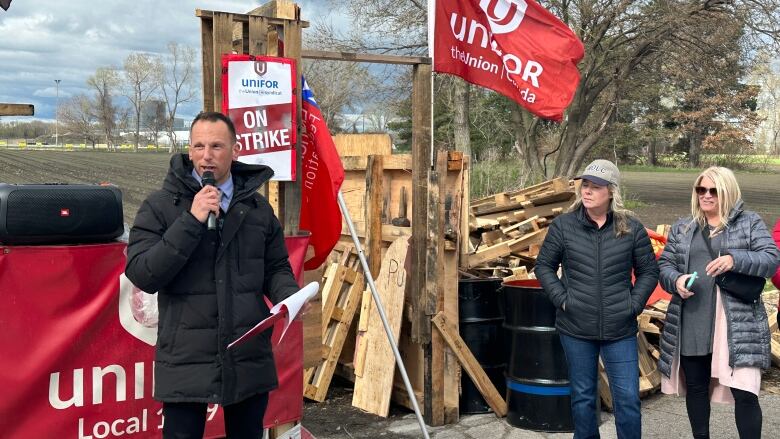 Windsor & District Labour Council interim president Mario Spagnuolo talks at a May Day rally on the picket line at Windsor Salt. 