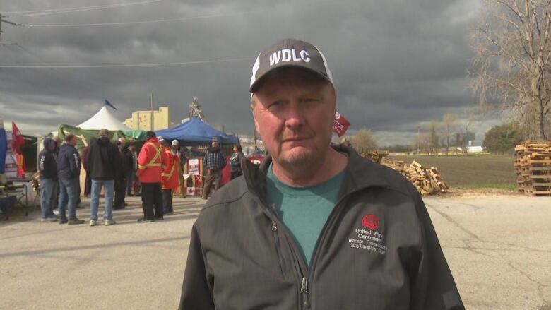 Bill Wark, with Unifor Local 1959, at a May Day rally on the picket line at Windsor Salt. 