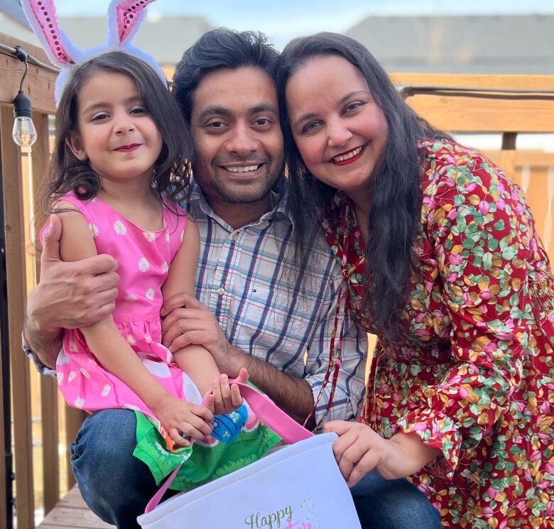 Ashish Verma is pictured with his wife and daughter in Calgary. 