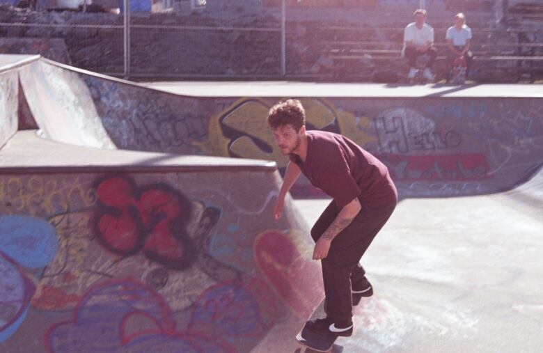 Dylan Landry, a local skateboarder skateboards in the Halifax Common