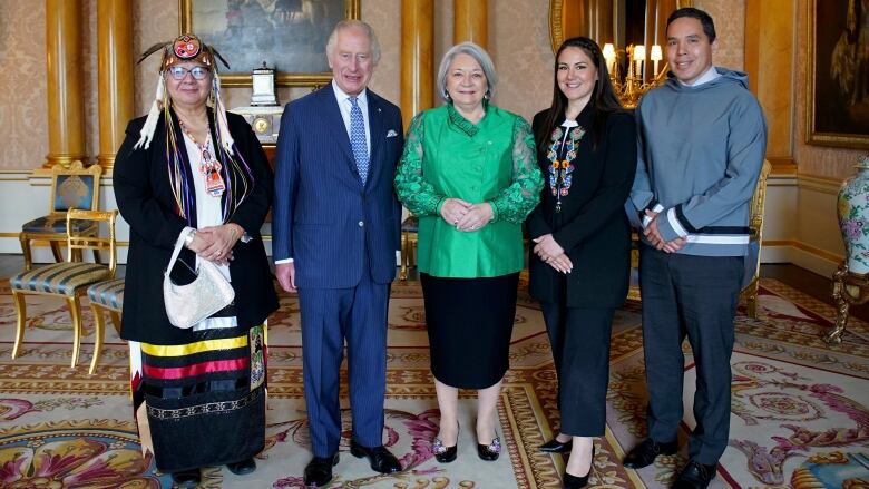 Britain's King Charles III receives, Roseanne Archibald, left, National Chief, Assembly of First Nations, H.E. The Rt Hon, Mary Simon, Governor General of Canada, Cassidy Caron, second right, President, National Metis Council and Natan Obed, right, President of Inuit Tapirlit Kanatami, during an audience at Buckingham Palace, London, Thursday May 4, 2023.