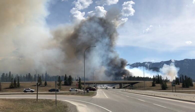 Smoke can be seen from the highway just outside of Banff in this photo taken Wednesday afternoon.