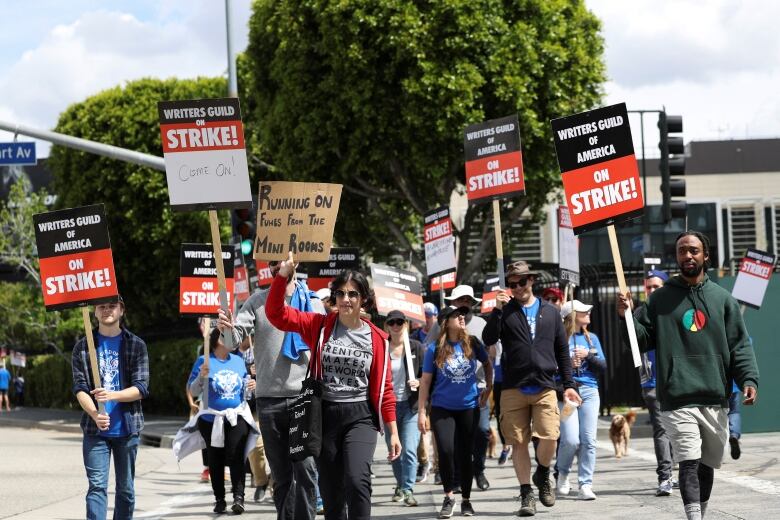 Hollywood writers picket outside Universal City - and area of Los Angeles, California.