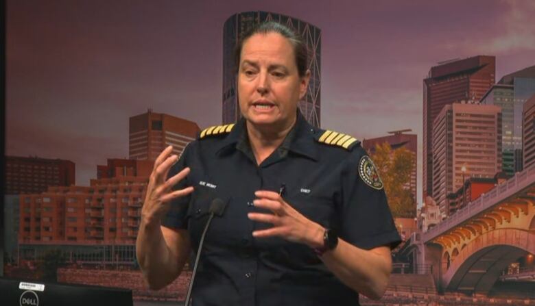 Chief Sue Henry with the Calgary Emergency Management Agency addresses the media in uniform.