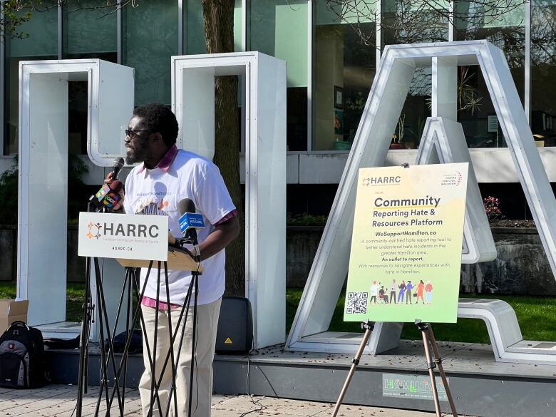 A man speaking at a podium.