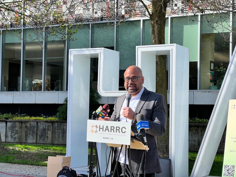 A man speaking at a podium.