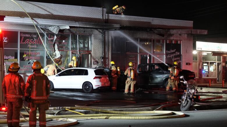 pizzeria with firetrucks