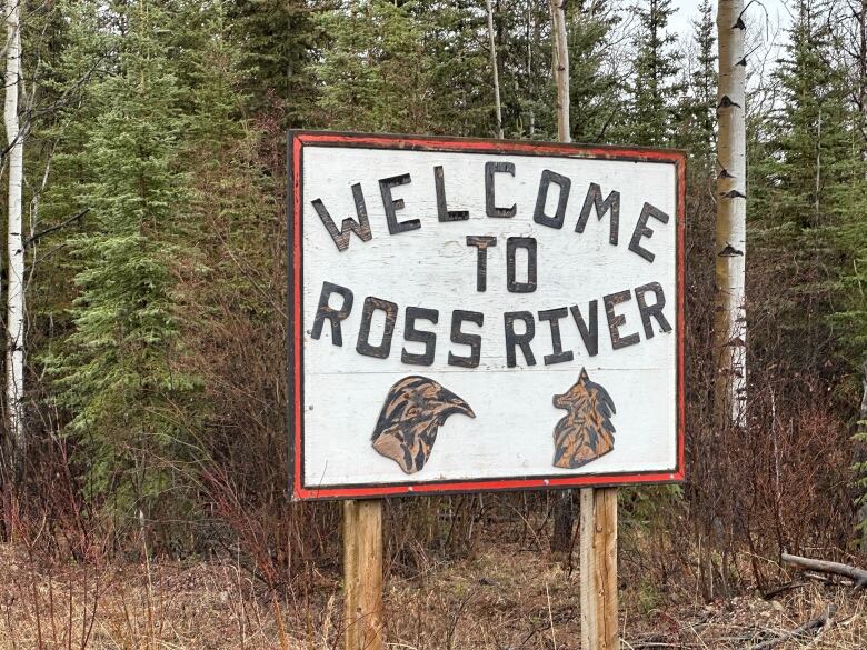 The photo shows a sign that says 'Welcome to Ross River'