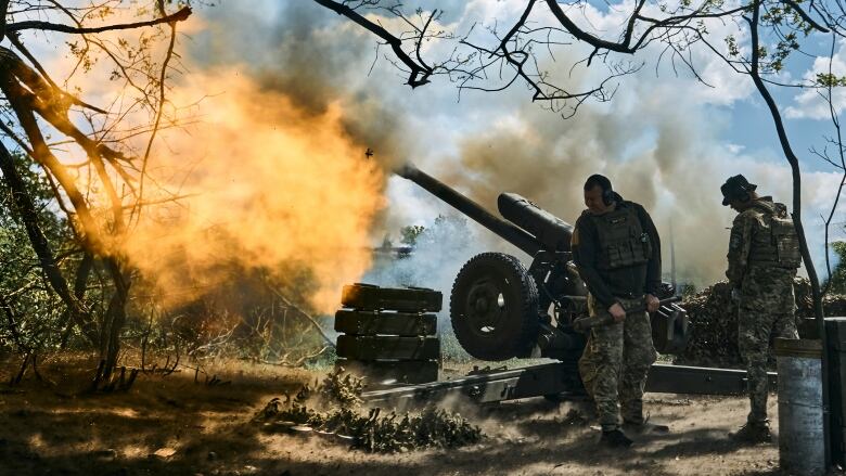 A cannon is fired by Ukrainian forces, near Bakhmut, Ukraine.