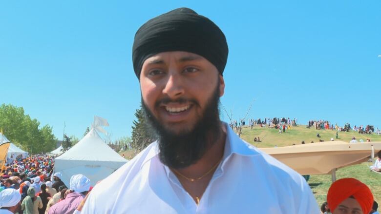 A man wearing a turban is pictured.