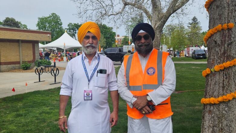 Karamjit Singh, left, and Gajinder Chopra, left are members of the London Sikh Society (LSS) who helped organize the event. 