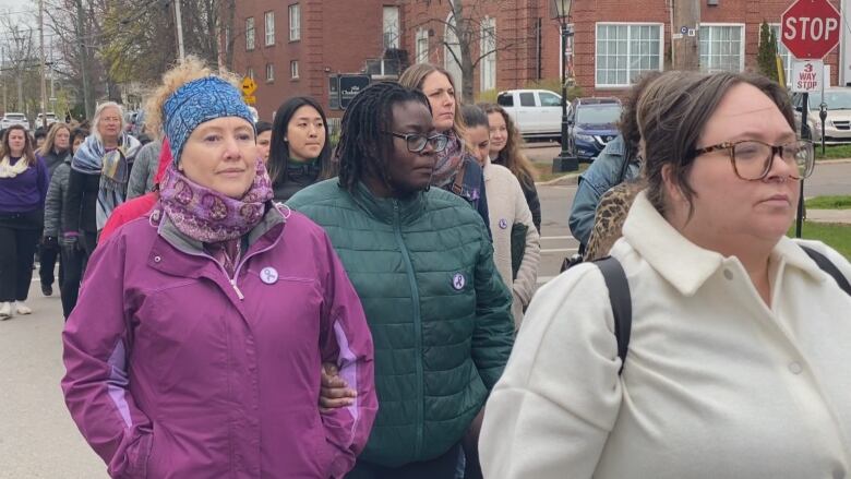 People march during Family Violence Prevention Week.