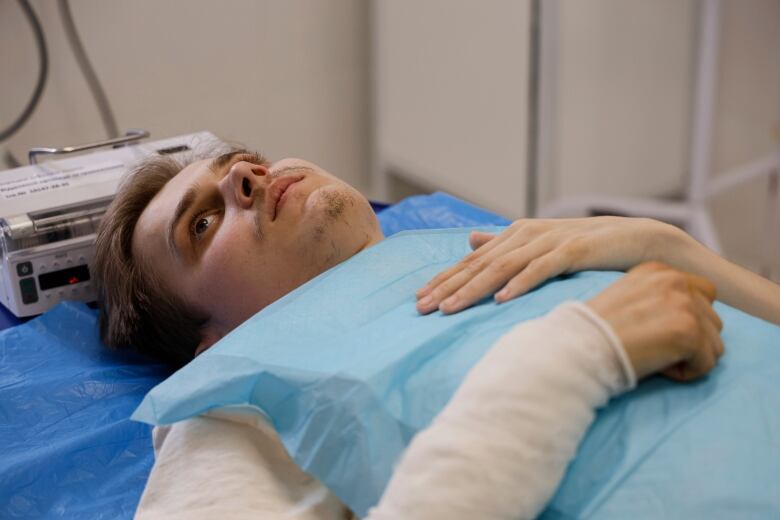 An injured Ukrainian soldier is seen at a Kyiv military hospital.