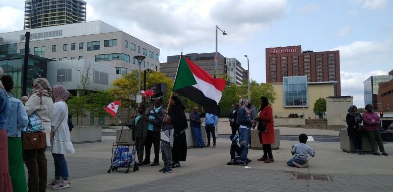 A person holding a flag.