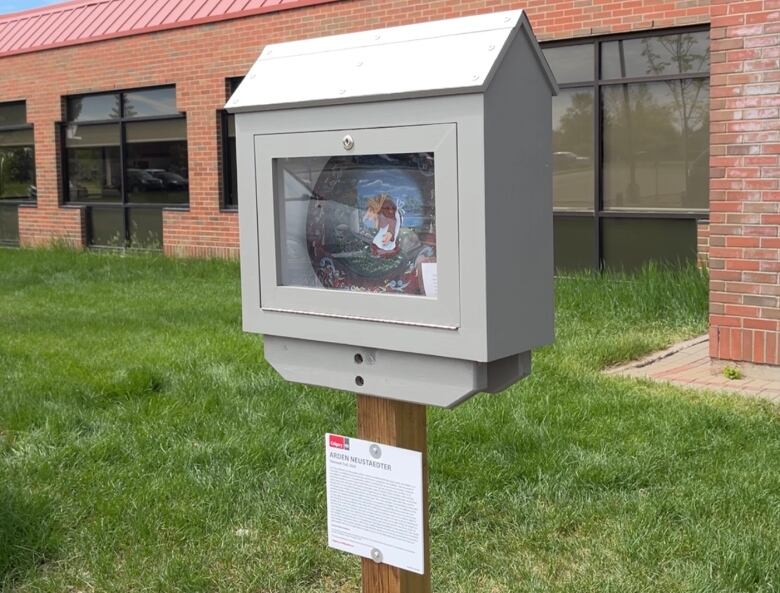 A painted plate influenced by Norwegian culture stands on display in Marlborough Park in northeast Calgary.