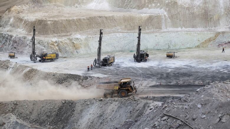 A truck arrives to ferry excavated gold, copper and zinc ore from the main mining pit at the Bisha Mining Share Company (BMSC) in Eritrea, operated by Canadian company Nevsun Resources, February 17, 2016. To match Special Report ERITREA-MINING/NEVSUN   REUTERS/Thomas Mukoya/File Photo