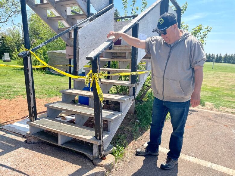 Homer Blacquiere looks over the steps the province has deemend unsafe.