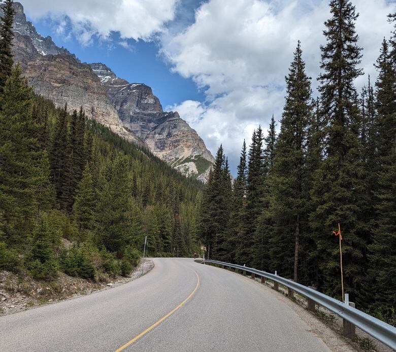 A road twists into the mountains.