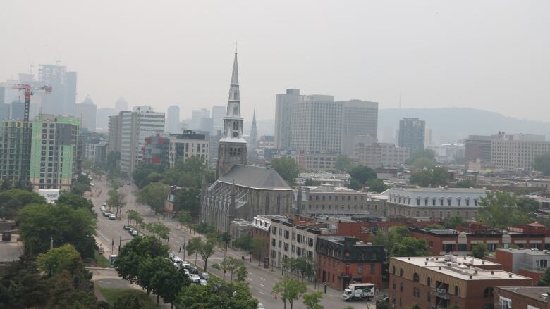 cityscape covered in smoke