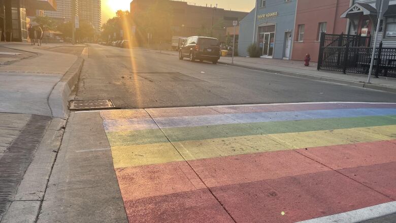 A rainbow crosswalk. 