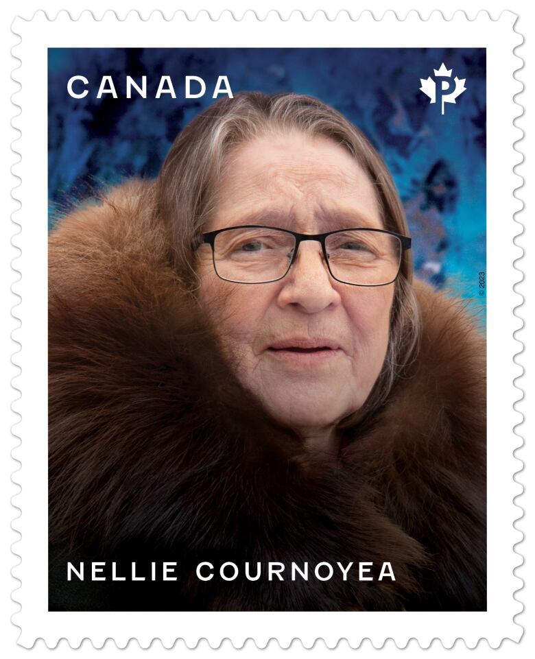 A stamp featuring a portrait of a woman wearing glasses and fur-trimmed coat is shown.