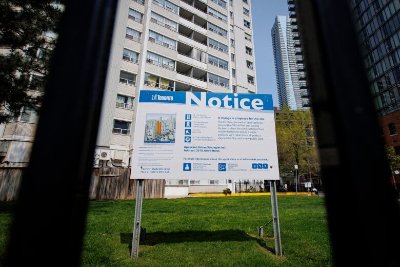 Residents of 25 St. Marys St., in Toronto, protest a proposal to demolish the apartment building to make way for a condo tower, on May 10, 2023.