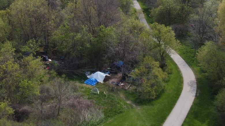 A homeless encampment near the Thames Valley Parkway. A council report says London's homeless population has growth in recent months, with those sleeping outside suffering from increasingly complex health issues. 